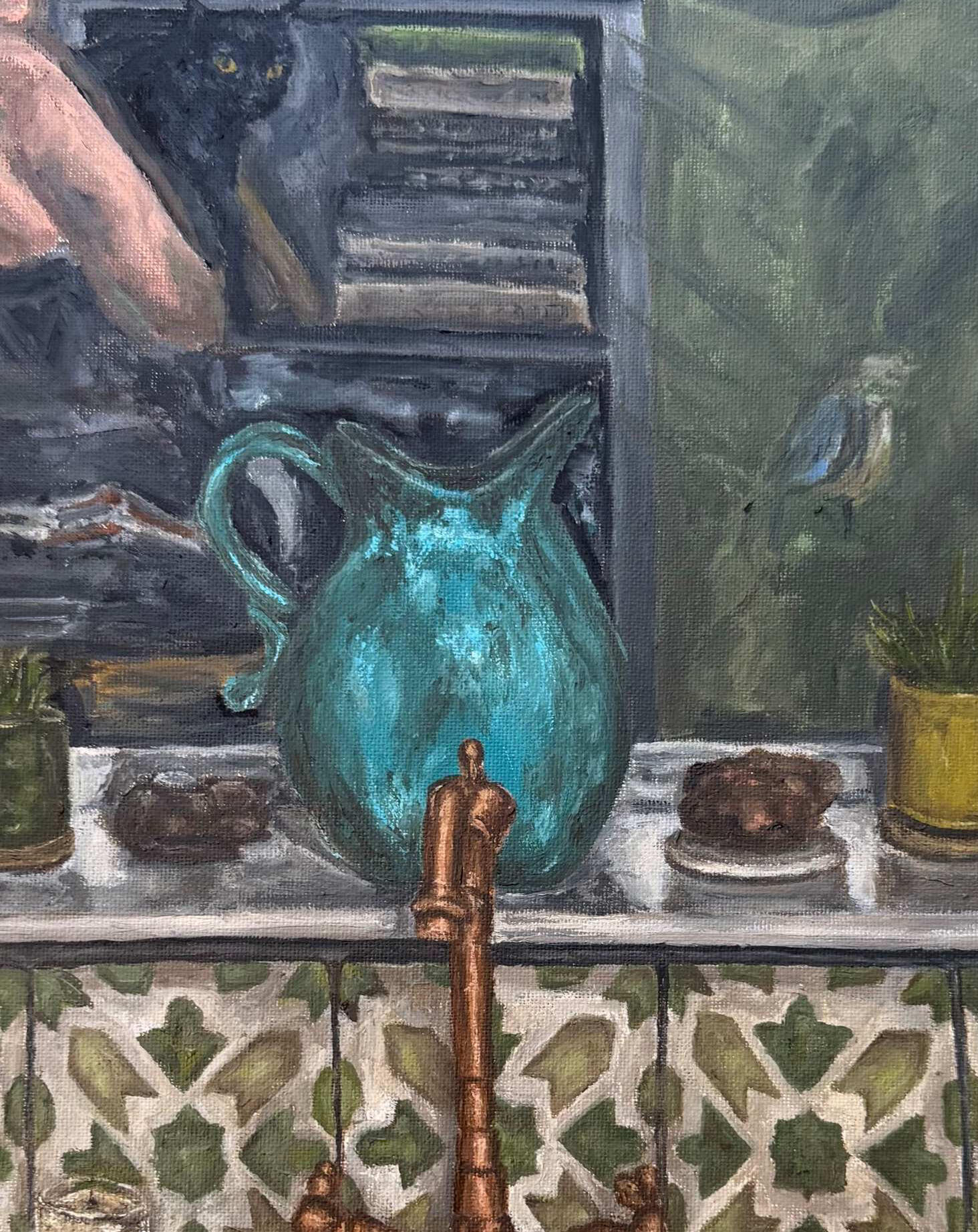 The Things We Keep Interior of a kitchen with reflected figure holding a cat in the window